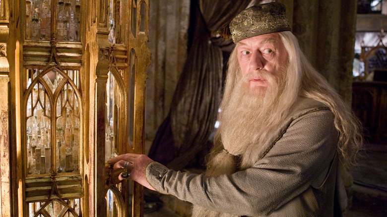 Dumbledore with Pensieve looking over shoulder