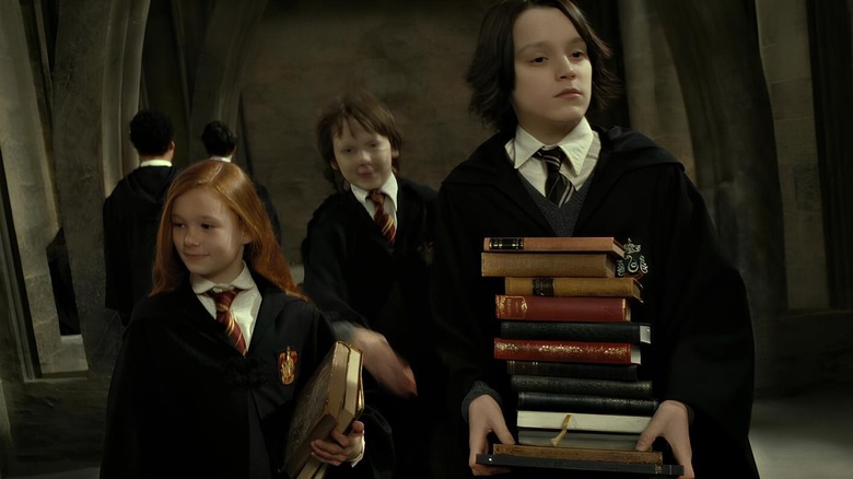 Lily and Snape with books