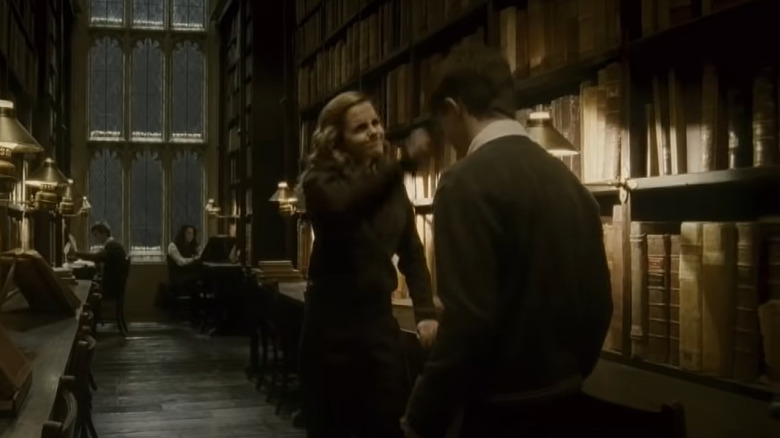 Hermione smacks Harry Potter