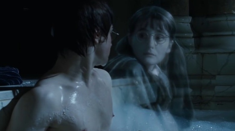 Harry Potter sitting with Moaning Myrtle