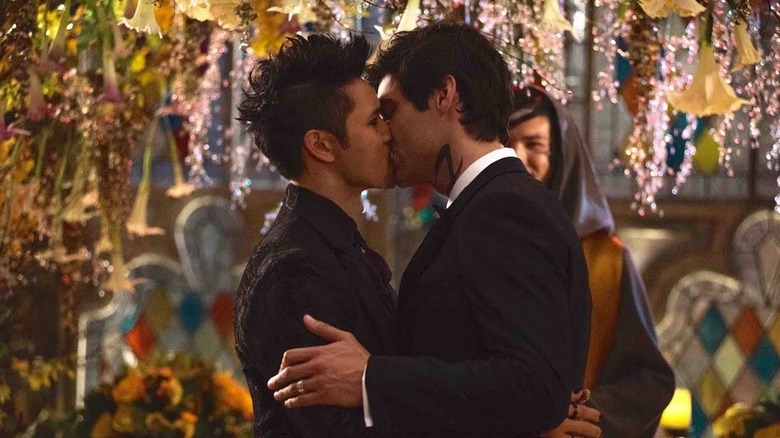 Magnus kissing Alec at wedding