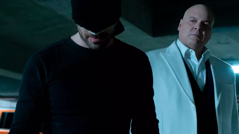 Kingpin glowering at a blindfolded Daredevil