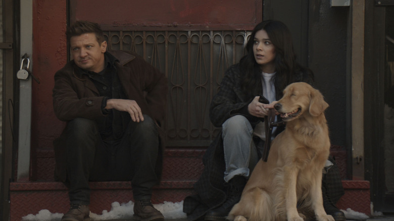 Clint, Kate, and Lucky on a stoop