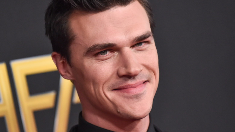 Finn Wittrock smiling