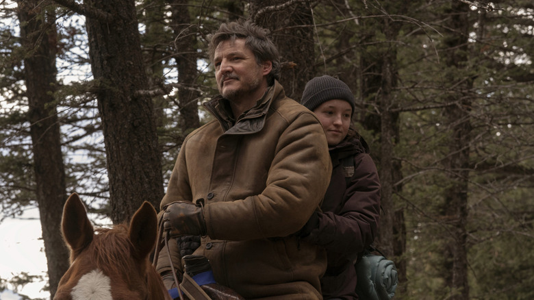 Ellie and Joel riding a horse