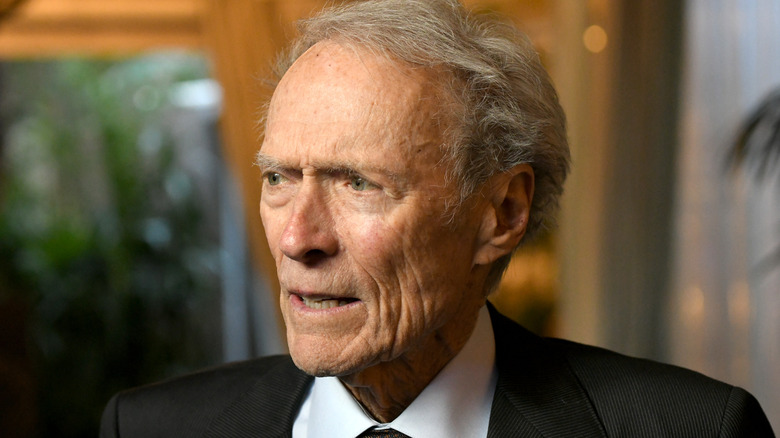 Older Clint Eastwood looking off to the side