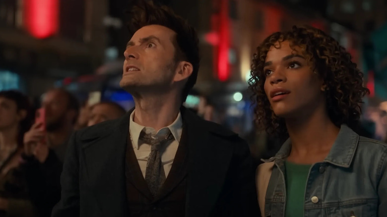 Rose and The Doctor stare off-screen