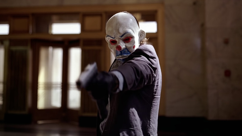 Joker robbing bank in The Dark Knight
