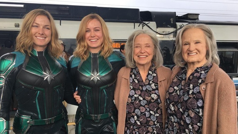 Renae Moneymaker, Brie Larson, Marilyn Brett, and Heidi Moneymaker on the set of Captain Marvel