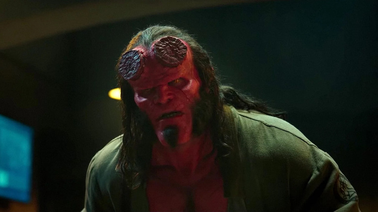 Hellboy looking confused and upset