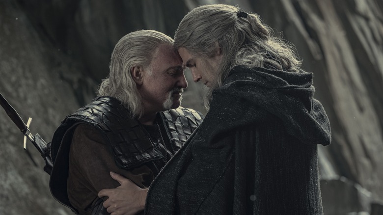 Vesemir and Geralt touching foreheads