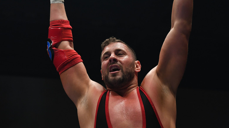 Colt Cabana raising his hands