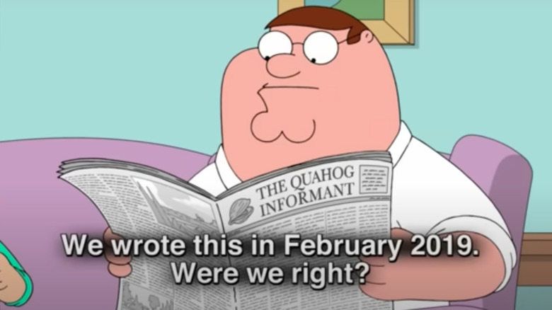 Peter Griffin reading a newspaper