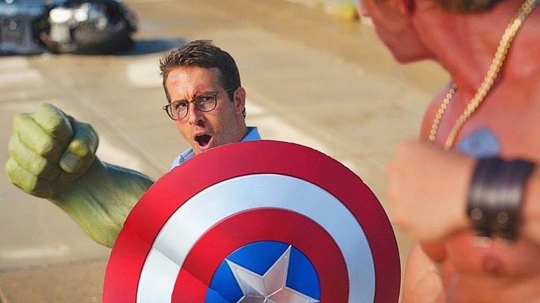 Ryan Reynolds with Captain America's shield
