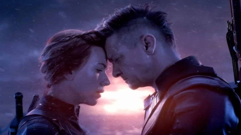 Black Widow and Hawkeye touching foreheads