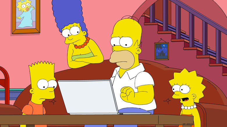 Simpson family looking at laptop