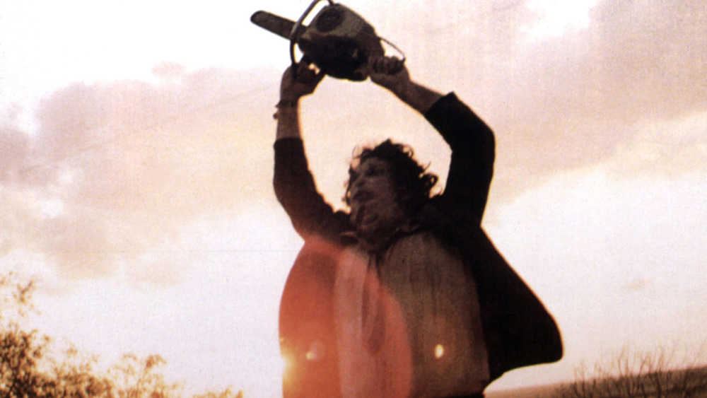 Leatherface waving chainsaw