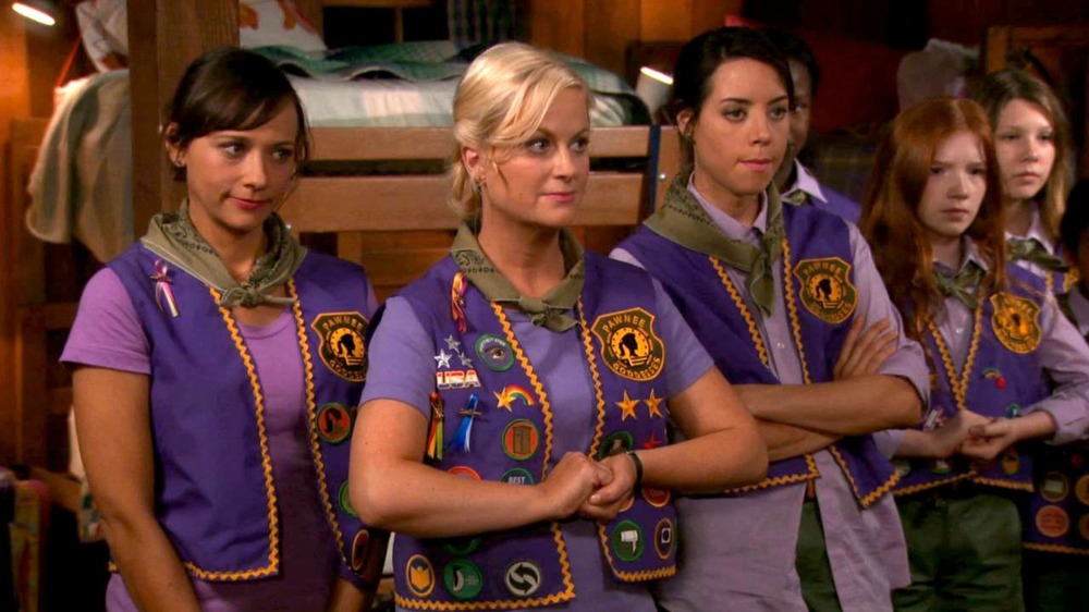 Ann, Leslie, and April wear Scout uniforms on Parks and Rec