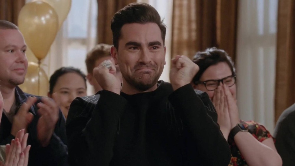 David Rose (Dan Levy) cheers on Schitt's Creek