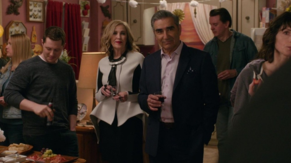 Moira (Catherine O'Hara) and Johnny (Eugene Levy) attend a baby sprinkle on Schitt's Creek