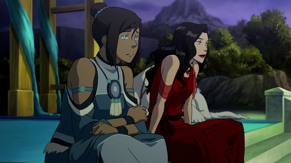 Korra and Asami sitting on steps