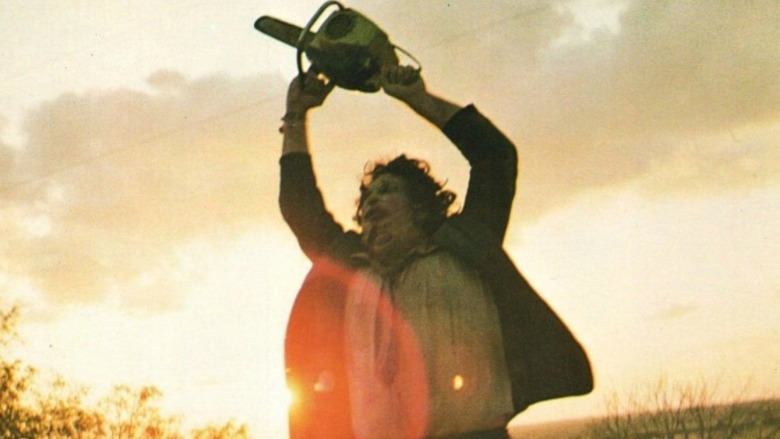 Leatherface wielding his chain saw