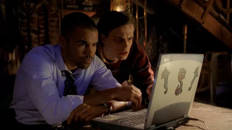 Reid and Morgan at laptop