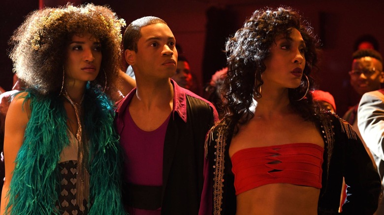 The cast of Pose watches intently