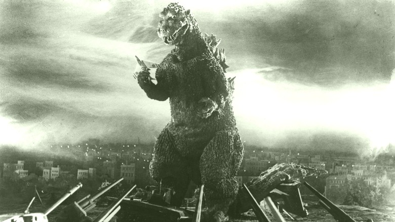 Godzilla standing in ruined city