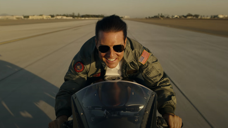 Tom Cruise riding motorcycle as Maverick