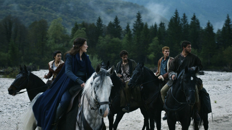 A group on horses in a mountain pass