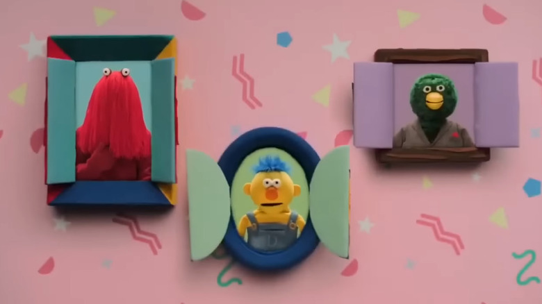 Pictures of Red Guy, Yellow Guy, and Duck on the wall