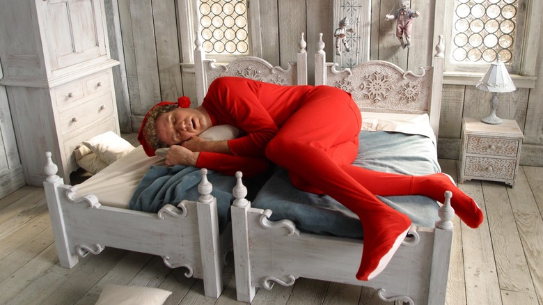 Elf's Will Ferrell in bed sleeping