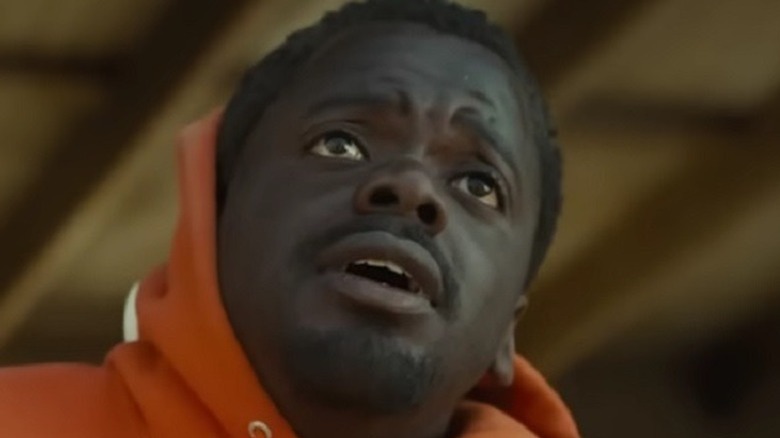 Daniel Kaluuya as Otis looking concerned