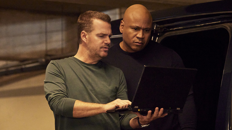 Callen and Hanna looking at laptop