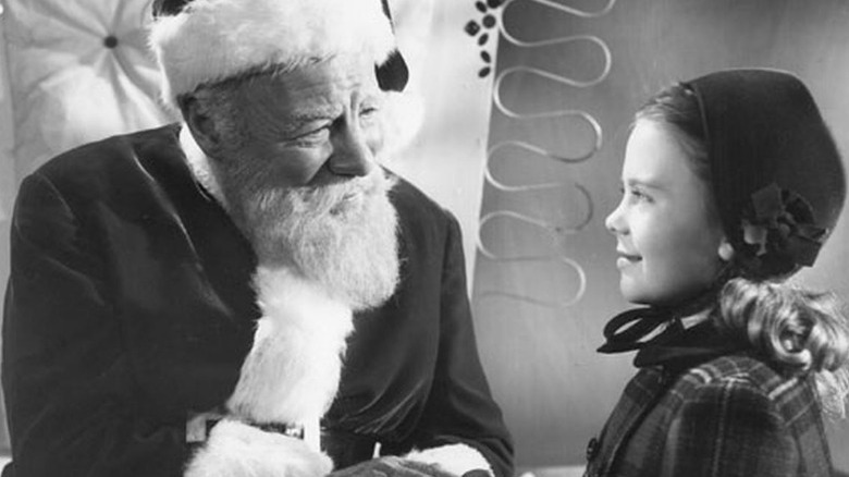 Kris Kringle and Susan Walker smiling