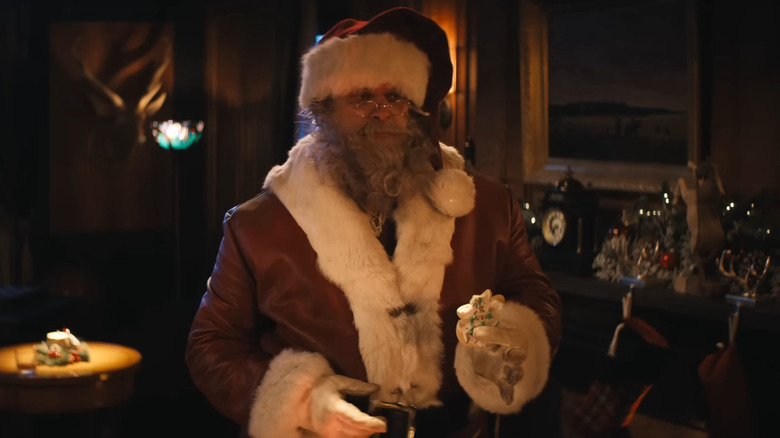 Santa Claus eating a cookie