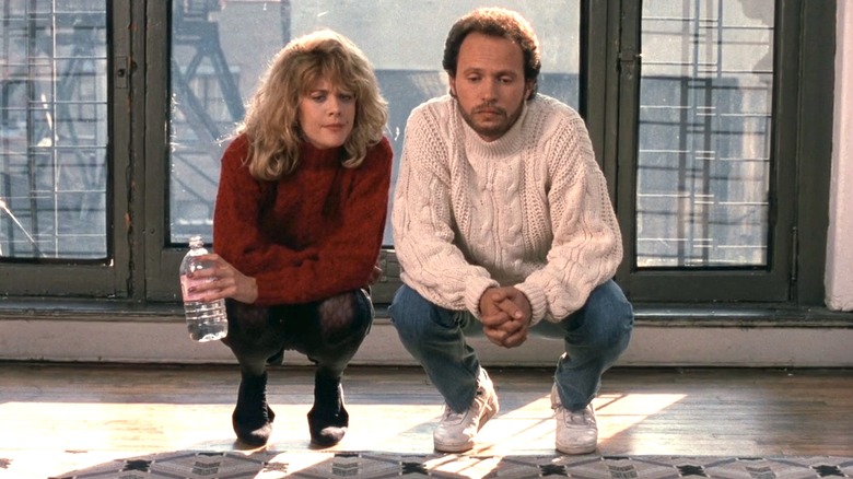 Harry and Sally crouching in apartment