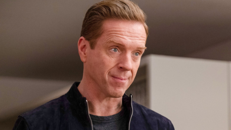 Damian Lewis raising his eyebrows