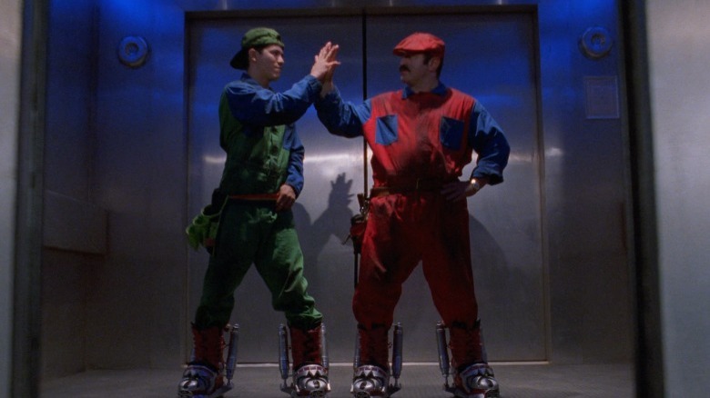 Mario and Luigi high five