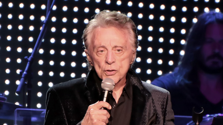 Frankie Valli sings at a concert