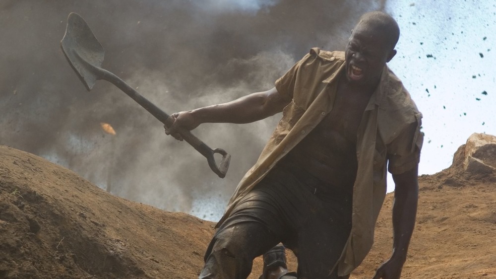 Solomon Vandy screaming with shovel