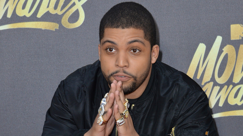 O'Shea Jackson Jr. pressing hands together