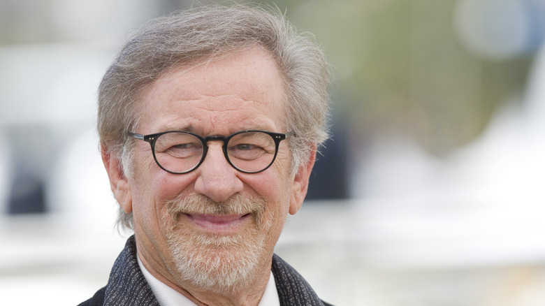 Stephen Spielberg smiling in glasses