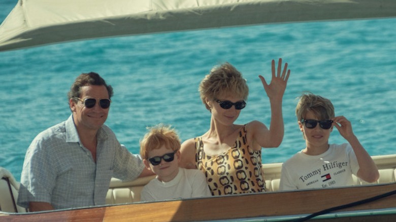 Charles, Diana, and their kids on boat