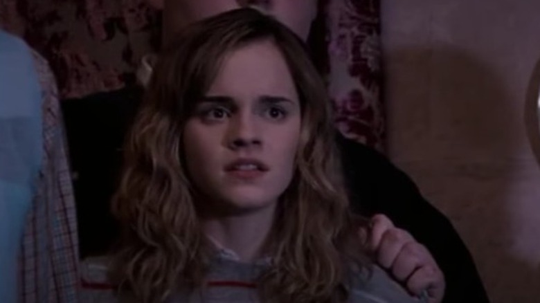 Scared Hermione wearing striped sweater