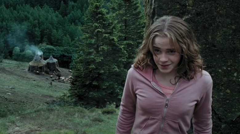 Hermione smiling wearing pink hoodie