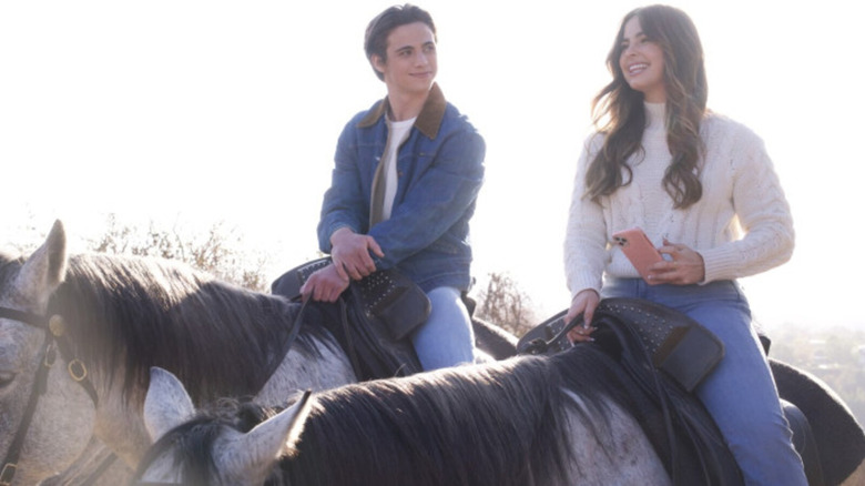 Padgett and Cameron riding horses