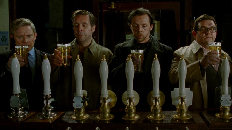 Martin Freeman, Paddy Considine, Simon Pegg, and Nick Frost drinking beer