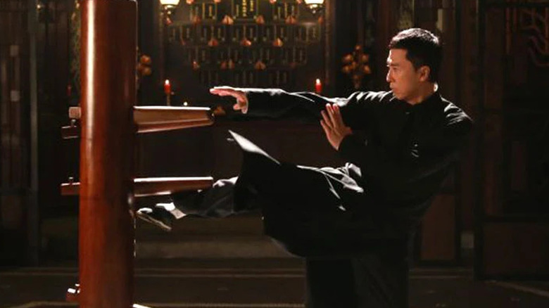 Donnie Yen hitting training dummy